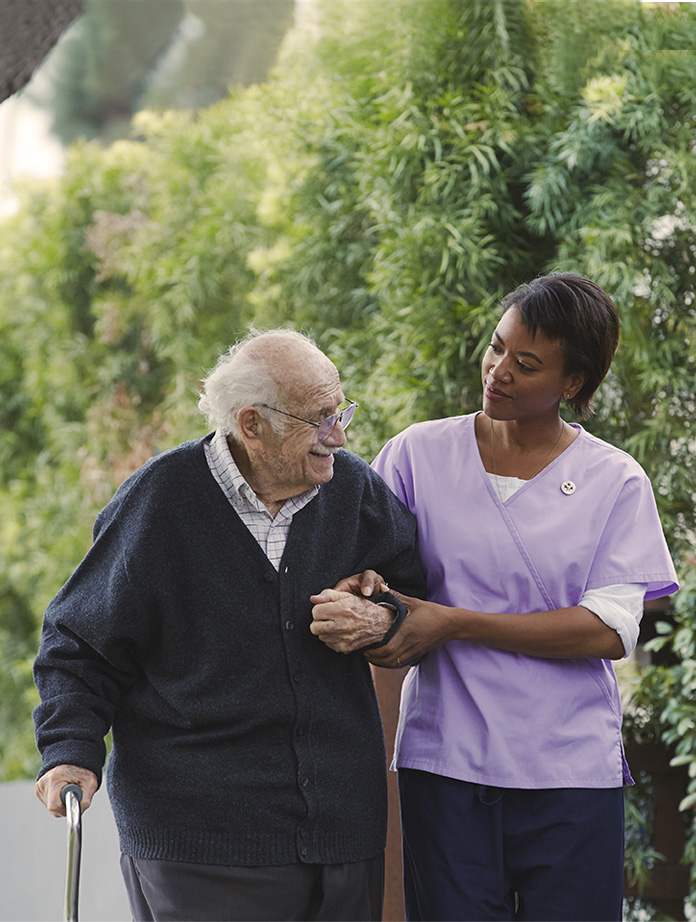 Aetna care manager helps handicapped member to car after doctor appointment